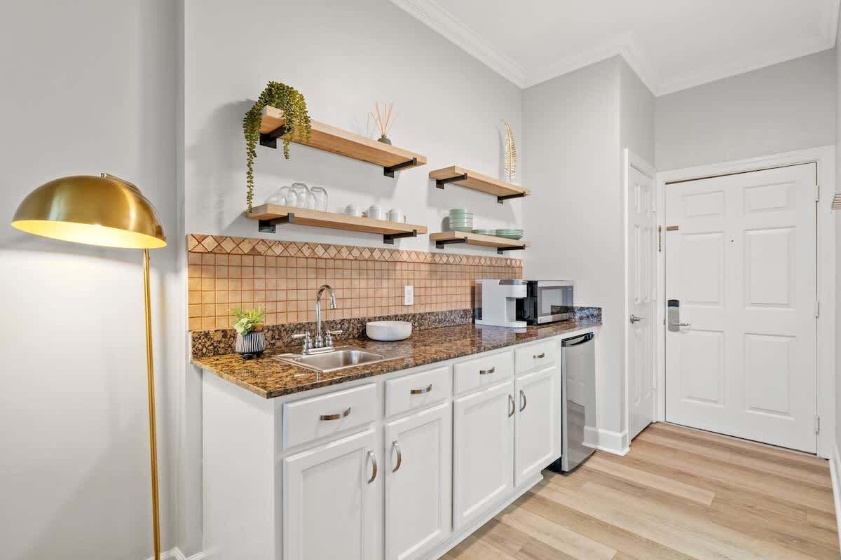 Microwave, coffee/tea maker, toaster, cookware/dishes/utensils