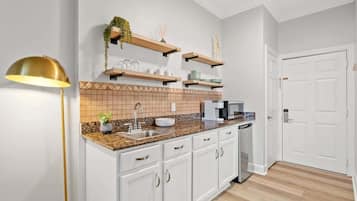 Microwave, coffee/tea maker, toaster, cookware/dishes/utensils