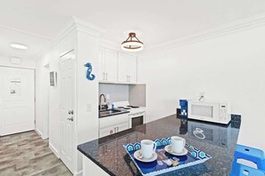 Fridge, microwave, oven, stovetop - Top of the Gulf 607 - Cozy Studio with Gulf View (Panama City Beach)