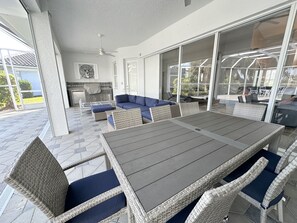 Outdoor dining - Elegant Port Charlotte Oasis: 3BR/3BA Home with Private Heated Pool & Pond View (Port Charlotte)