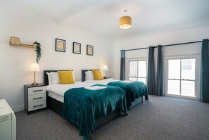 4 dormitorios, tabla de planchar con plancha, wifi gratis y ropa de cama