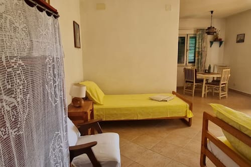 Studio (Studio Apartment With Terrace (A2)) | 1 bedroom, cots/infant beds
