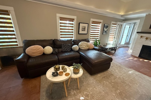 Silver Room 2 - Bed and Breakfast St. Cloud | Living area | 55-inch Smart TV with digital channels, fireplace, smart speakers