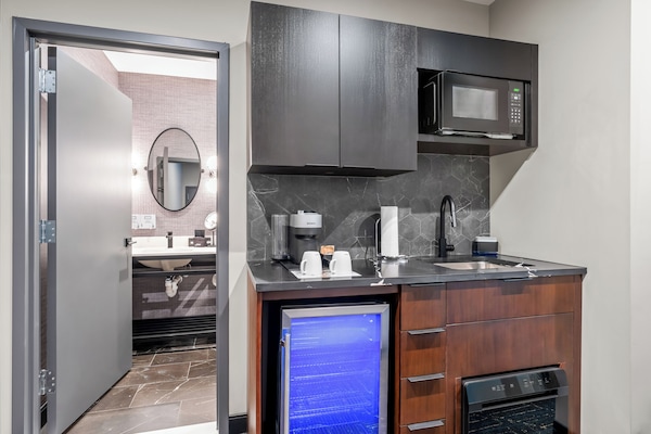Suite, 1 King Bed, City View | Private kitchenette | Coffee/tea maker, mini-fridge, microwave, dishwasher