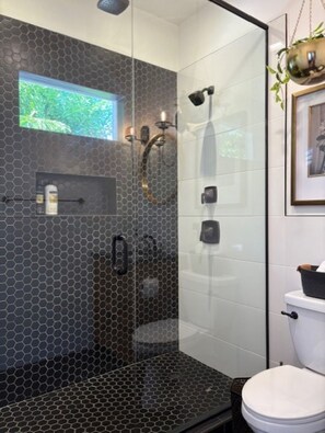 Shower, hair dryer, towels, soap