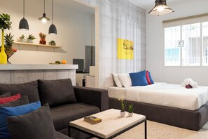 Studio, 1 Double Bed, Kitchen | Living area | 38-inch Smart TV with cable channels, streaming services - Garage Studio in Mar Mikhael (Beirut)
