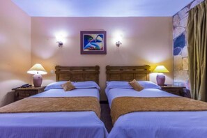 Luxe beddengoed, een minibar met enkele gratis items, gratis wifi