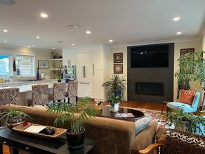 Living room with fireplace - Warm Family Retreat in the Heart of Coquitlam (Coquitlam)