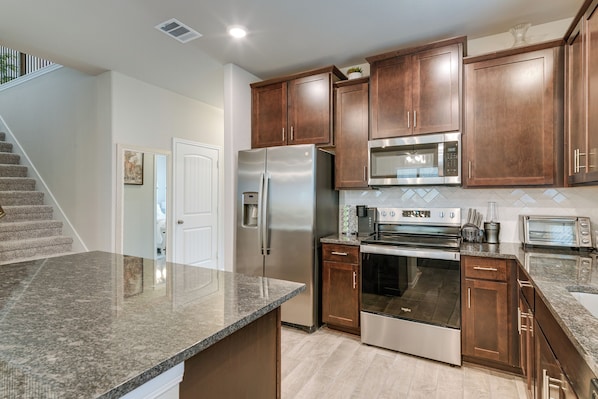 Fridge, microwave, stovetop, dishwasher - Lake Conroe Home w/ Resort-Style Perks & Patio (Montgomery)