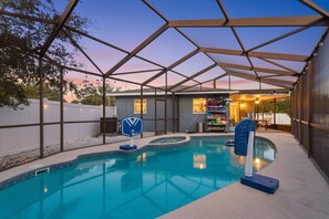Outdoor pool, a heated pool - Tropical Play Oasis W / Pool, Firepit, & Bowling (Seminole)