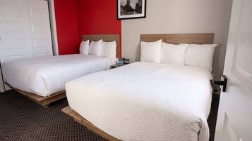 Suite, 2 Double Beds, Non Smoking | Minibar, desk, laptop workspace, soundproofing