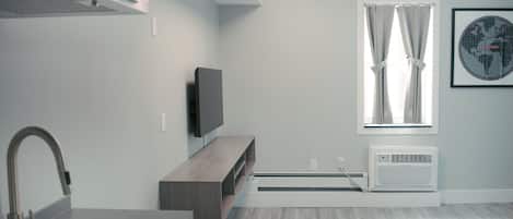 Suite, 2 Double Beds, Non Smoking | Living area | 43-inch Smart TV with cable channels