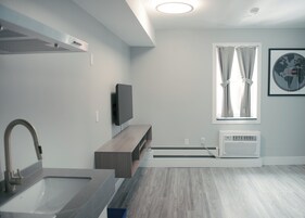 Suite, 2 Double Beds, Non Smoking | Living area | 43-inch Smart TV with cable channels