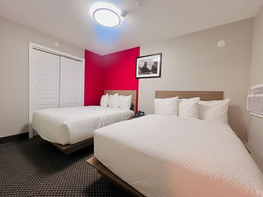 Suite, 2 Double Beds, Non Smoking | Minibar, desk, laptop workspace, soundproofing