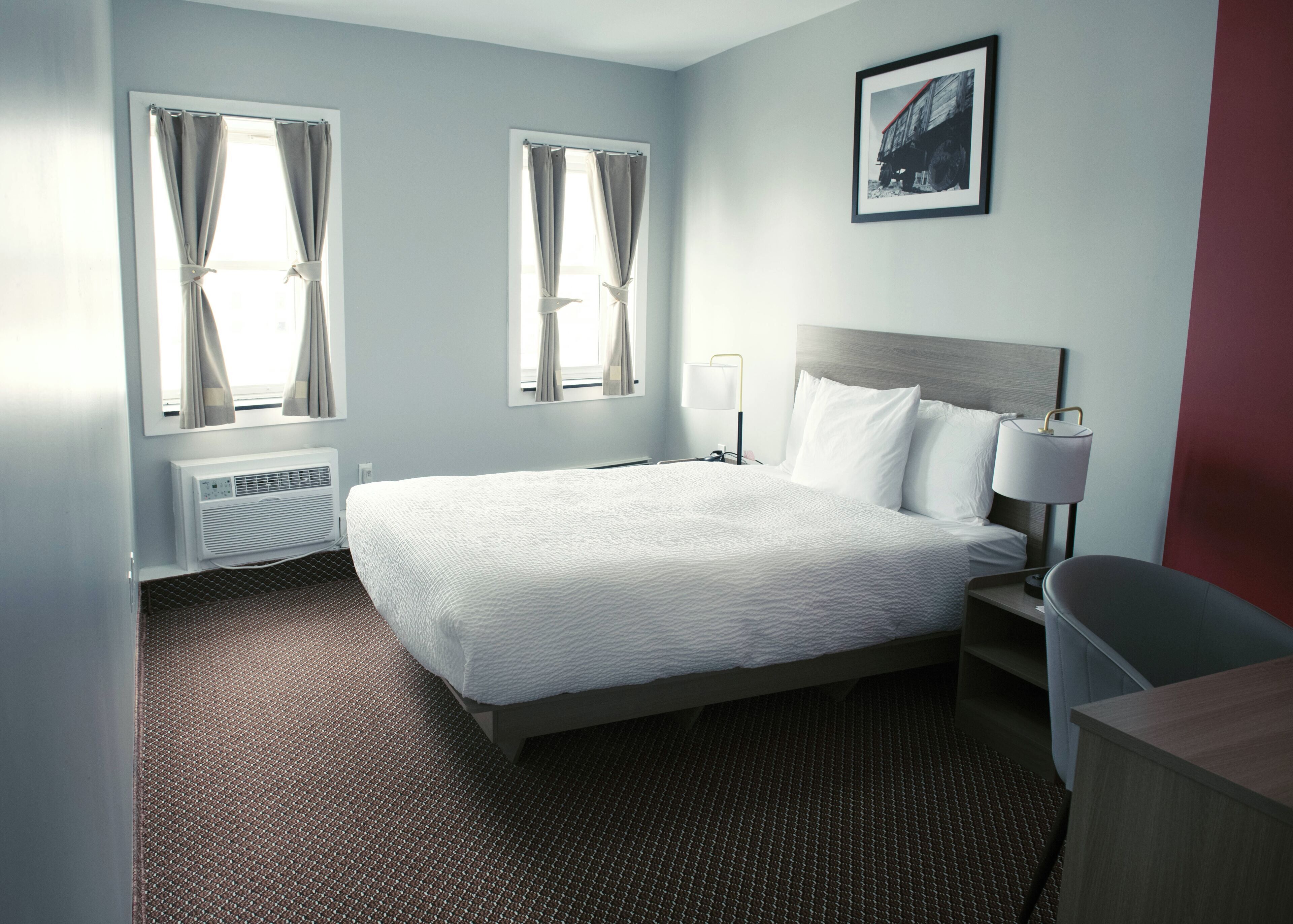 Suite, 1 cama Queen size y sofá cama, para no fumadores | Minibar, escritorio, espacio para trabajar con laptop y insonorización 