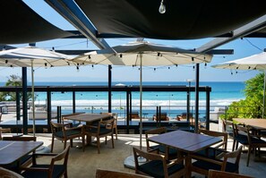 Outdoor dining - Modern 4BR Luxury Condo with Ocean Views • Naya (Punta De Mita)