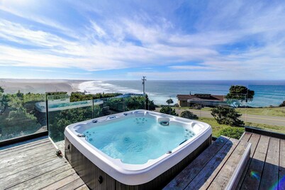 Stunning ocean view home with hot tub and deck