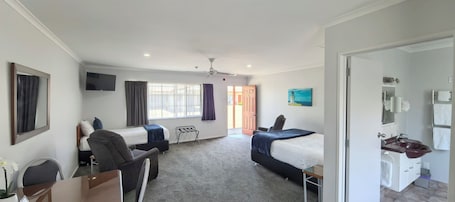 Triple Room, Patio | In-room safe, desk, laptop workspace, soundproofing