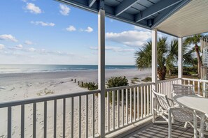 Outdoor dining - Beachfront condo with stunning Gulf views, pool access, and modern comforts. (Indian Shores)