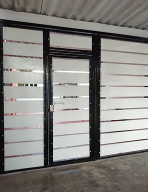 Interior - Casa Tamarindo, Queen size bed, Fully equipped kitchen, Downtown area (Puerto San Carlos)