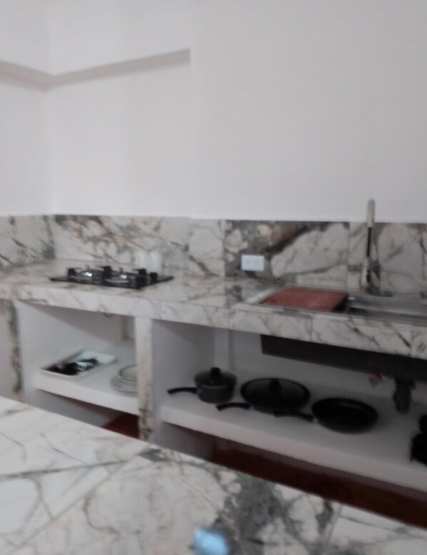 Stovetop - Casa Tamarindo, Queen size bed, Fully equipped kitchen, Downtown area (Puerto San Carlos)