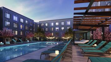 Una piscina al aire libre de temporada, cabañas de piscina gratuitas