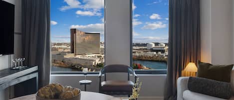 Luxury Apartment, 1 Bedroom, Kitchen | Living area | 65-inch LED TV with cable channels, Hulu, books