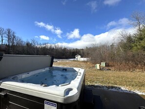 Bañera de hidromasaje al aire libre