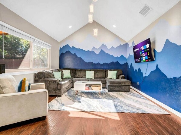 Smart TV, fireplace, books