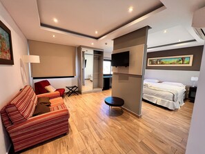 Chambre Double Présidentielle, vue ville | Coin séjour