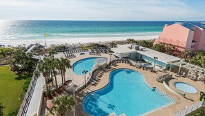 A resort with multiple swimming pools, a beach, and a view of the ocean. - Exclusive 2BR beachfront condo with gulf views (Miramar Beach)