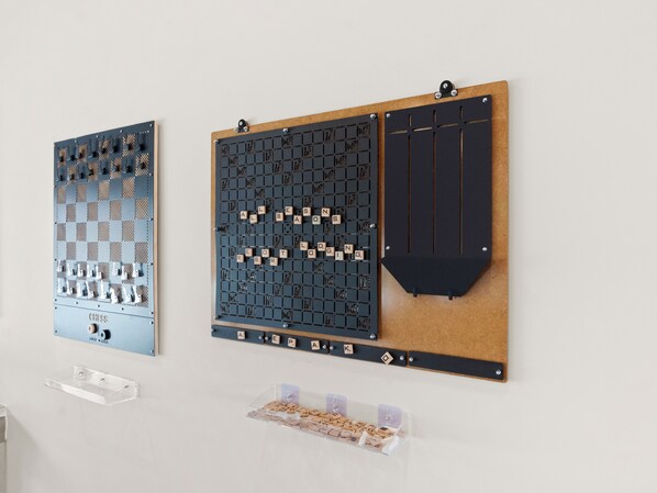 Two word puzzles mounted on a wall. - Mayflower Lakeside 104 | Reservoir + Mountain View | Full Kitchen | Private Bedrooms (Heber City)