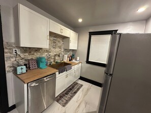 Fridge, microwave, stovetop, dishwasher - Bright 3BR Home • Prime Location by Grosse Pointe & Downtown Detroit (Detroit)