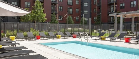 Seasonal outdoor pool, free pool cabanas, pool umbrellas