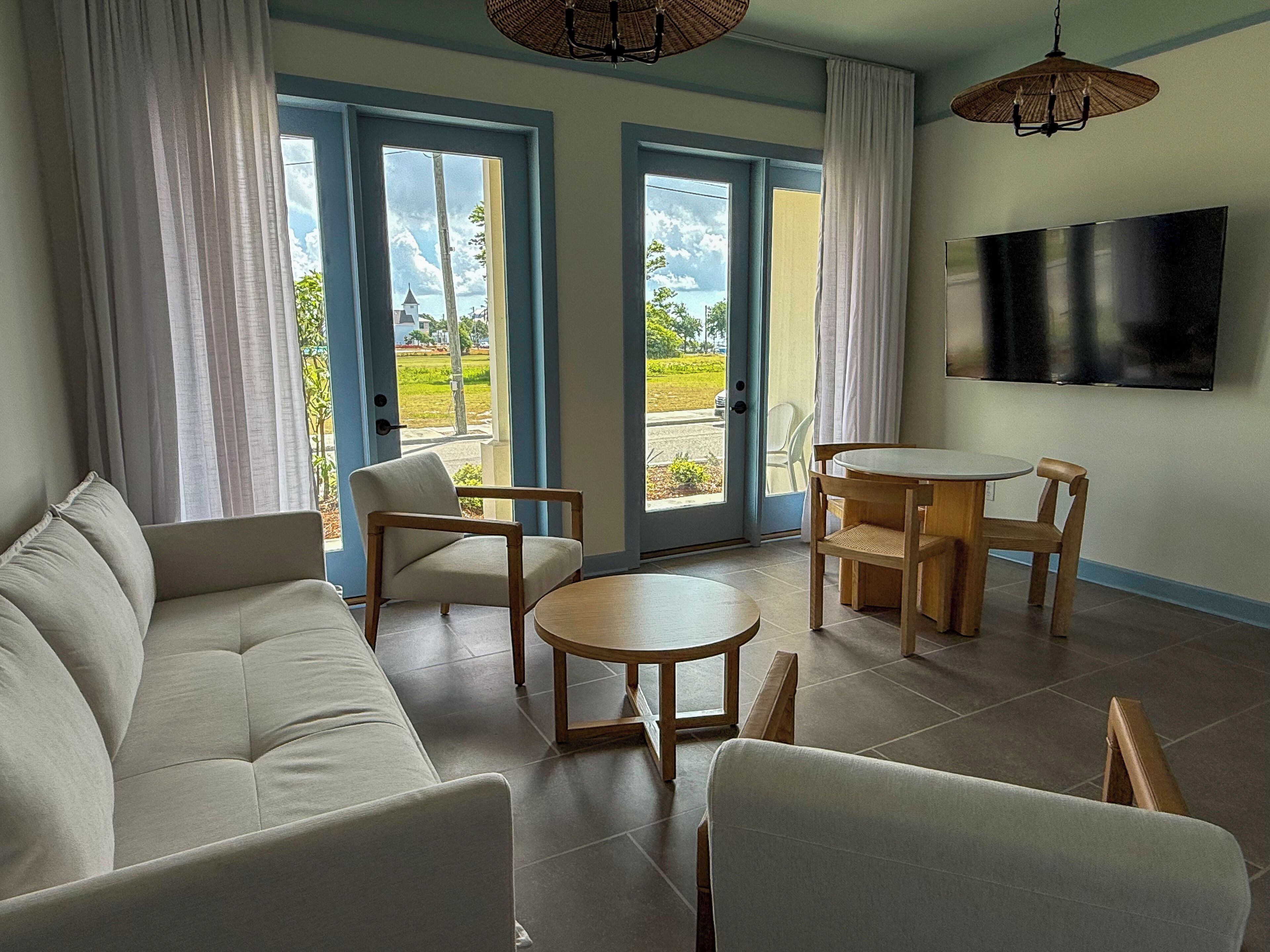 Suite, 2 Bedrooms | Living area | 65-inch Smart TV with digital channels