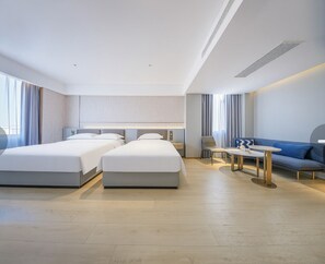 Family Triple Room, City View | Premium bedding, down comforters, memory foam beds, free minibar - Echarm Plus Hotel (Taiyuan)