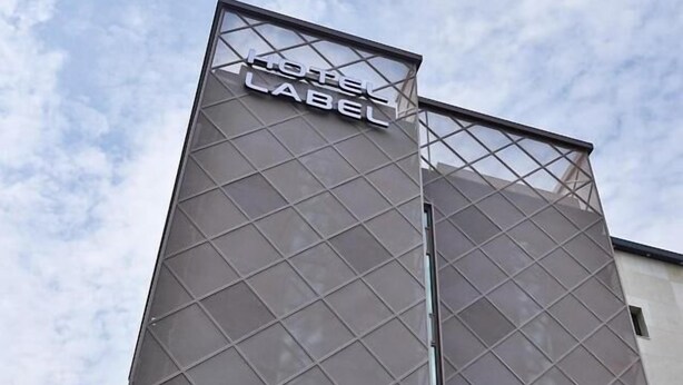 A hotel sign with a modern geometric design and the name "HOTEL LABEL" prominently displayed. - Hotel Label Seongnam (Seongnam)