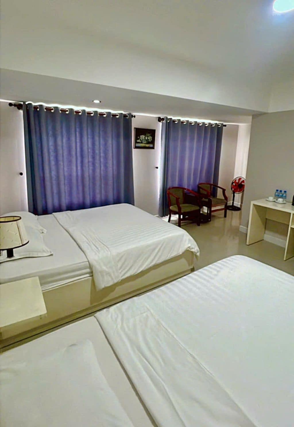 Neljän hengen deluxe-huone | Työpöytä, kannettavalle tietokoneelle sopiva työtila, ilmainen Wi-Fi