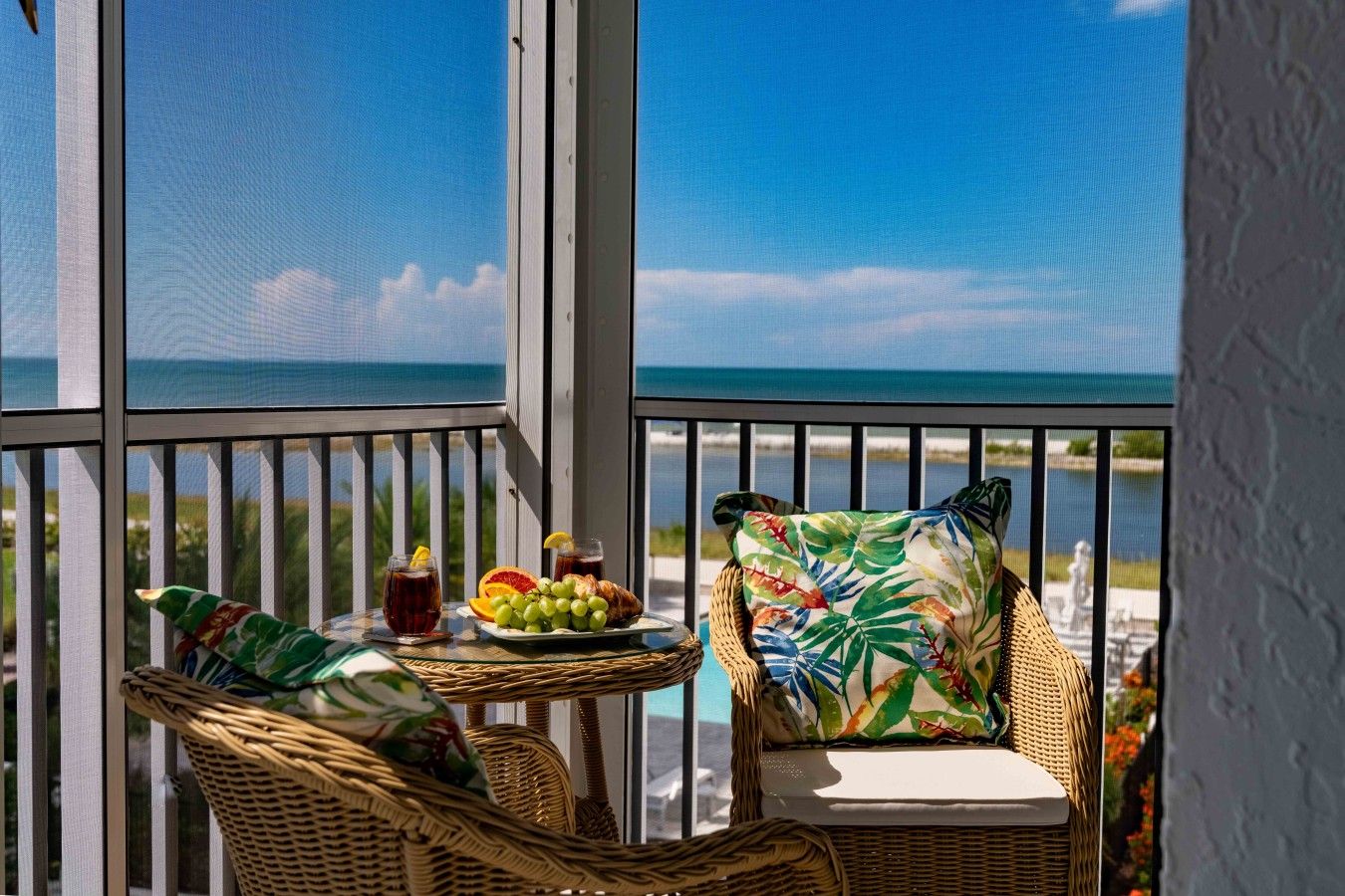 Start the day on the screened lanai with fresh fruit and a wide Gulf view