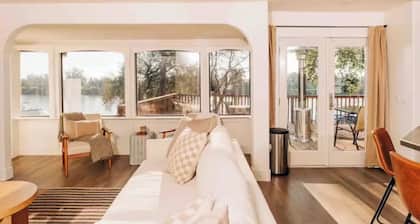 Stay right on the water with this 2 bedroom 1.5 bath charming stay!