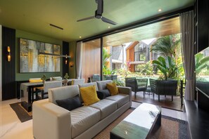 Deluxe Villa, 1 Bedroom, Balcony, Pool View | Living area | 32-inch Smart TV with digital channels - Sunset Lagoon Rice Field Villa  (Ubud)