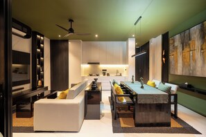 Deluxe Villa, 1 Bedroom, Balcony, Pool View | Living area | 32-inch Smart TV with digital channels