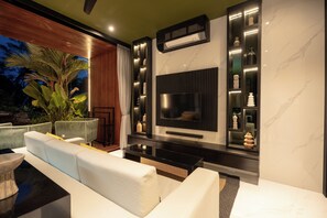 Deluxe Villa, 1 Bedroom, Balcony, Pool View | Living area | 32-inch Smart TV with digital channels - Sunset Lagoon Rice Field Villa  (Ubud)