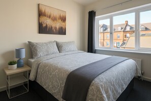 Iron/ironing board, bed sheets