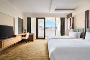 Suite, 1 Bedroom | Minibar, in-room safe, iron/ironing board, bed sheets - Hilton Muscat Al Bandar (Muscat)