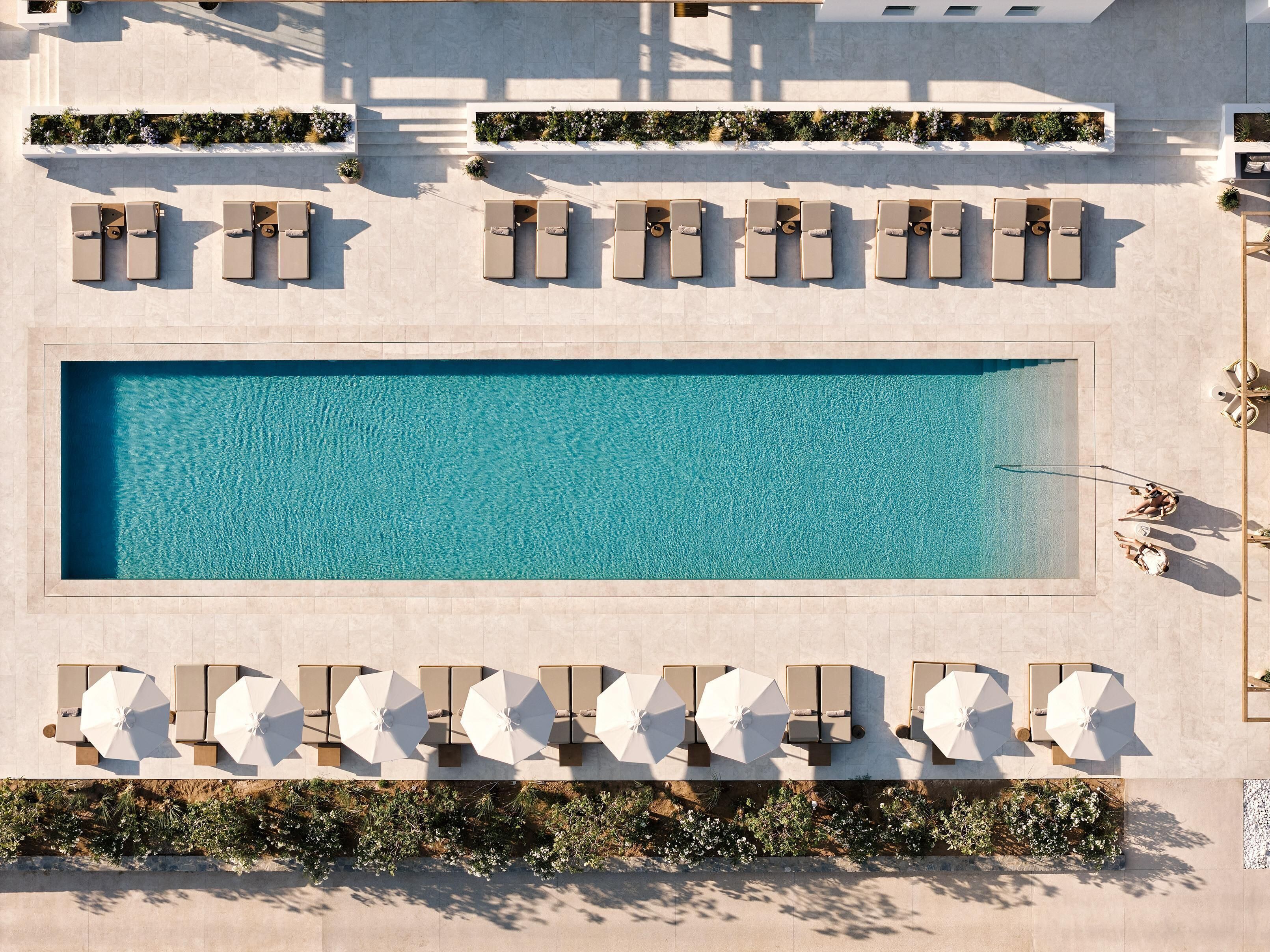 Seasonal outdoor pool, pool umbrellas, sun loungers