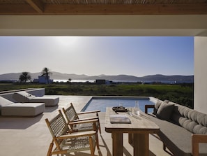 Seasonal outdoor pool, pool umbrellas, sun loungers
