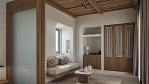 A modern interior with a built-in bench, a round table, and a wooden wardrobe. - Parian Chronicle Hotel Paros, Destination by Hyatt (Paros)