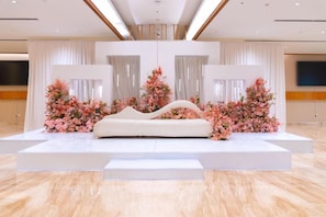 A modern hotel lobby with a central seating area, large windows, and a flat-screen TV mounted on the wall. - Tulip Inn Majan Hotel (Salalah)