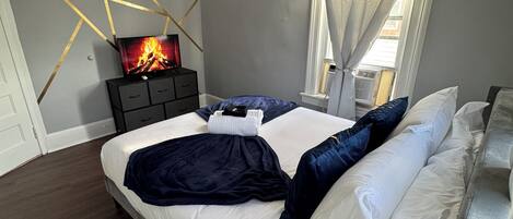 Planxa i posts de planxar, wifi i roba de llit